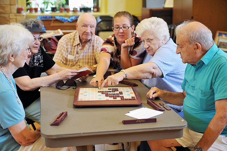 People Playing a game in long-term care home.